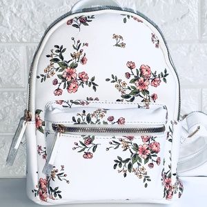 brand new small travel backpack in white with tag!